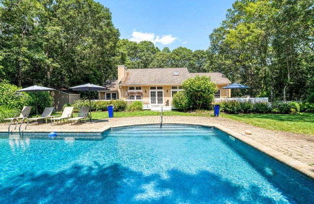 Charming East Hampton Escape with Heated Pool & Spacious Yard