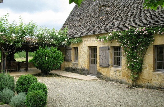Charming, elegant farmhouse near Sarlat with private pool, orchards and gardens.