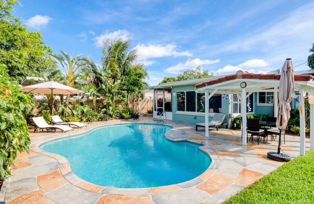 Charming home with oasis-like backyard, pool, washer/dryer, & central AC