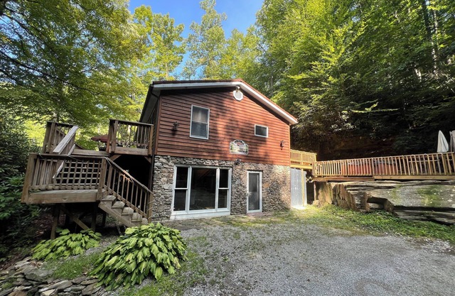 Charming riverfront home with beautiful views, hot tub and game room. Fishing!