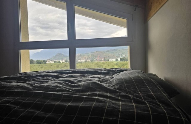 Charming Swiss Apartment in Bramois with Alpine Views.