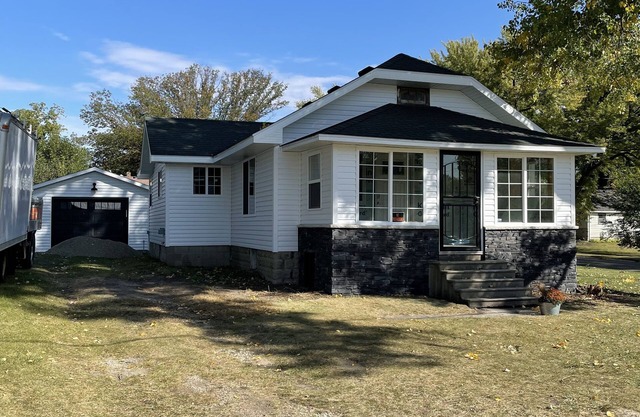 Charming two bedroom on the corner, newly renovated with a sweet porch.