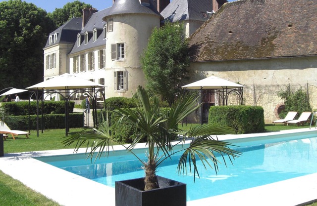 Chateau life, chic and bucolic with swimming pool in a large private park.