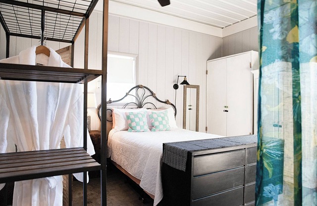 Clean and cozy barn home nestled in the trees with peaceful outdoor spaces!