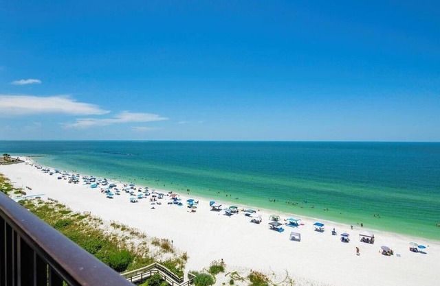 Come and get those Toes in the Sand at this fabalous Beachfront Condo.