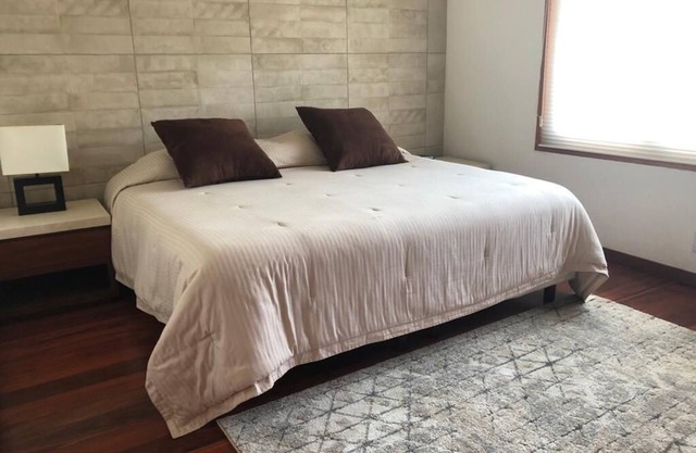 Comfortable Bedroom 2, King size bed, closet, private bathroom and Smart TV 50"