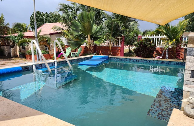 Comfy Studio with large veranda + Shared Pool