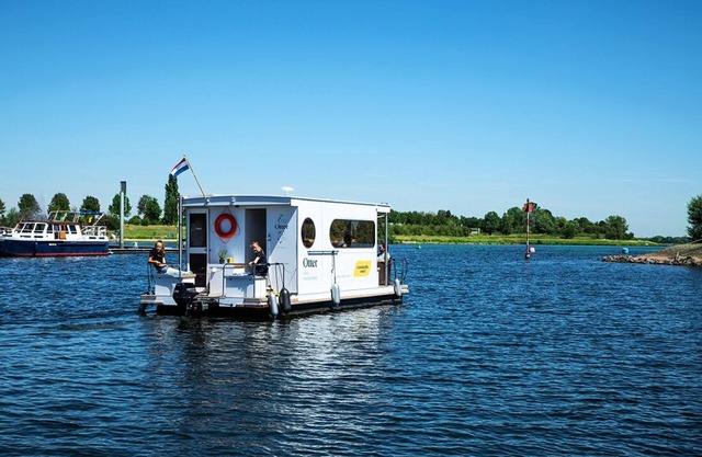 Compact Houseboat sailing and stationary for rent. No boating license required