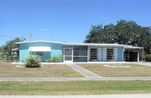 Completely remodeled beautiful waterfront property on canal with dock