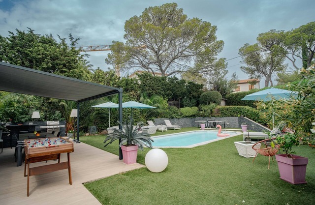 Contemporary villa close to the beach with heated pool in a residential area