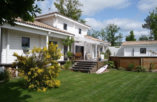 contemporary villa wooden large volume, heated pool, 4km beach, 2 to 10 pers