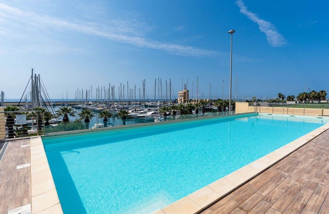 Cosy apartment for 4 guests with pool, WIFI, A/C, TV, terrace, pets allowed and parking