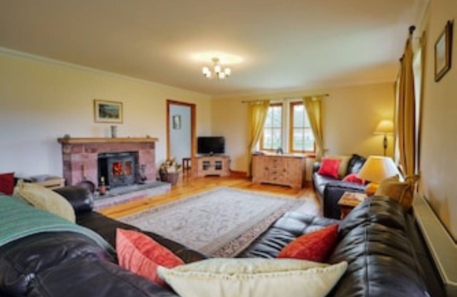 Country farmhouse sleeps 9 with enclosed garden and games barn.