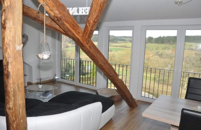 Cozy apartment with a fantastic view over the valley and horse meadows