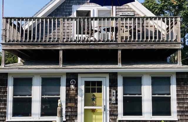 Cozy Beach Cottage just steps to a small quiet beach and public boat ramp.