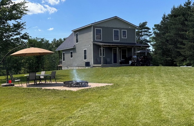 Cozy Kingston Cottage - 3-bedroom Lodge with AC, Peloton Bike, WiFi, and More