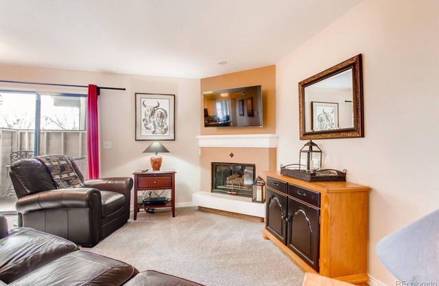 Cozy main floor 2-bedroom condo with pool & fitness area