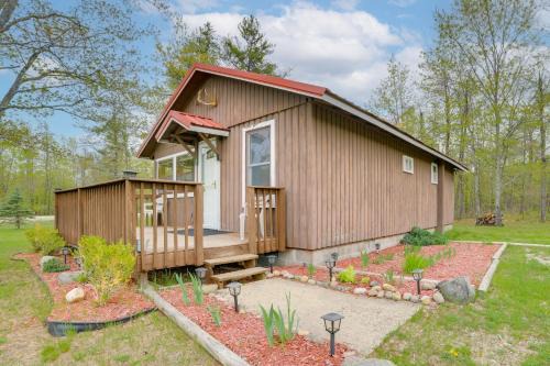 Cozy Onaway Vacation Rental with Deck and Fire Pit!
