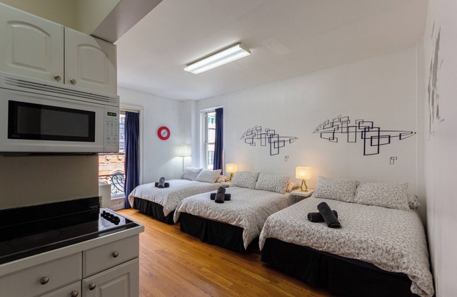 Cozy STUDIO 3 Full beds in Midtown 1
