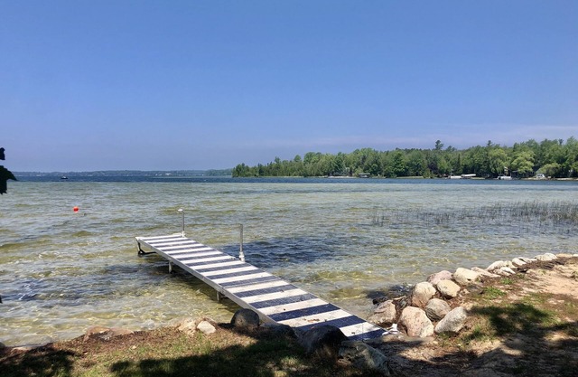Cozy waterfront sunset cottage on Lake Leelanau. Air, Near Leland.
