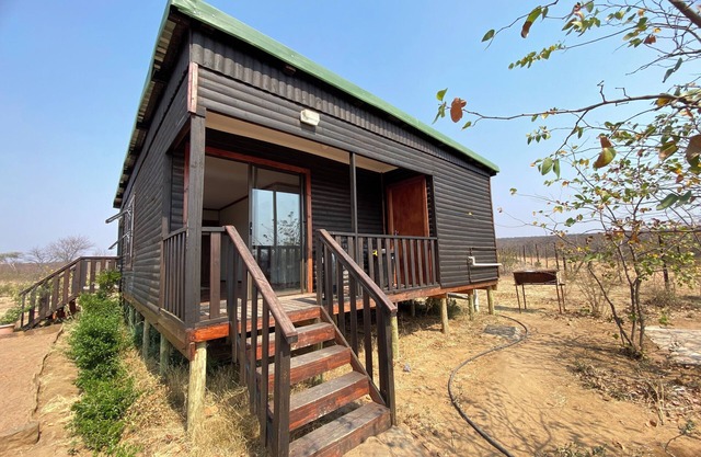 Cozy wooden cabin overlooking the foot of the Tswapong Hills in Palapye.