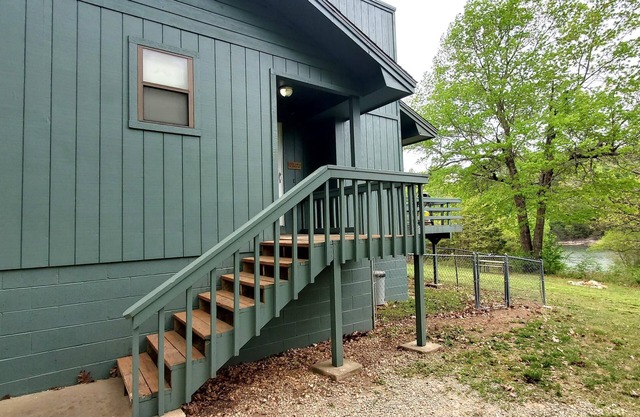 DECK OVERLOOKS THE PEACEFUL SERENITY OF THE LAKE