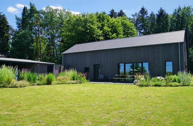 Design home with large fenced natural garden & fireplace