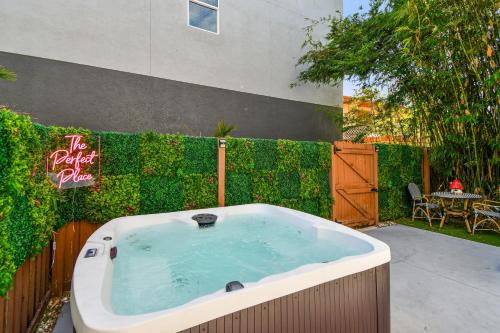 Designer Sun Filled Condo - Walk to Town