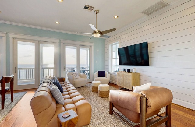 Dog-friendly bayfront home with elevator, pools, hot tubs & game room