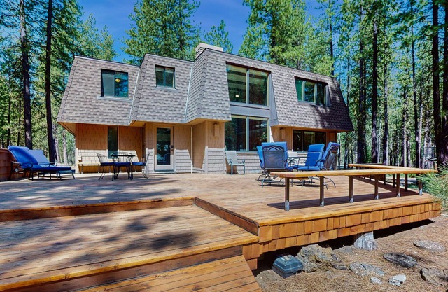 Dog-friendly cabin with pool, sauna, private hot tub, & great deck
