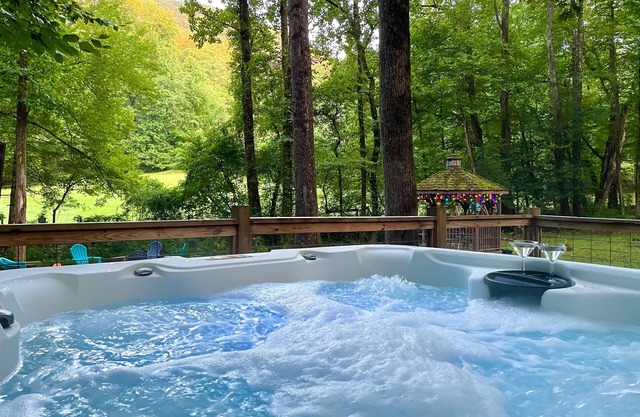 Dog-friendly, creek-side cabin with hot tub, open floor plan & multi-level decks