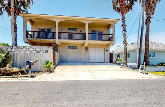 Dog-friendly escape on the canal with furnished deck, beach access nearby, & AC