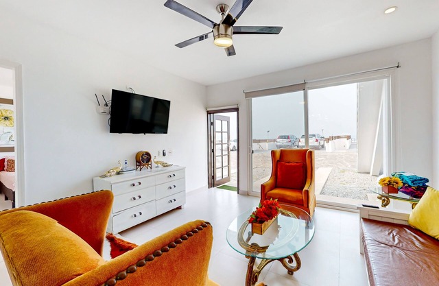 Dog-friendly villa with heated outdoor pool, hot tub, streaming, partial views