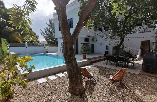 Downtown Dangriga. Entire property. Private pool. Sleeps 20. Handicap Accessible
