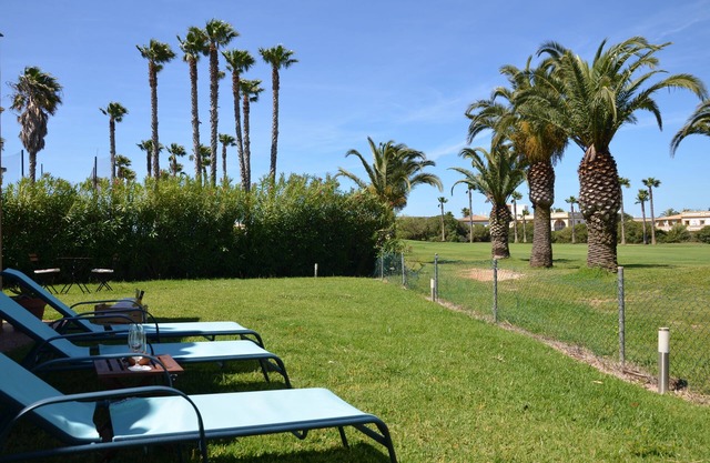 Duplex townhouse with sea views, garden, porch, golf and beach within walking distance