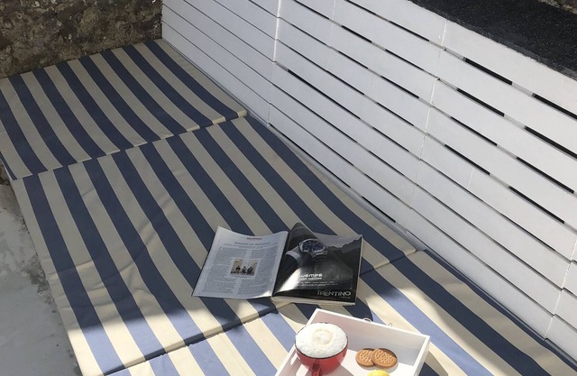 Ein Gemütliches Häuschen 20m vom Strand mit Patios auf 2 Ebenen