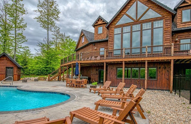 Elegant mountain-view home with private hot tub, saltwater pool & foosball