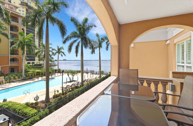 Elegant, Upscale Waterfront Condo! Unforgettable Sunsets! Stunning Pool & Pool Deck! Free Parking