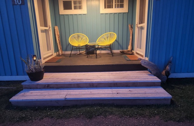 Enchanting pastel mint space created for families adjoining rooms with bathrooms