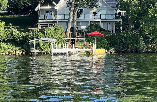 Enjoy 150' Of Lake Frontage Steps From Your Home!
