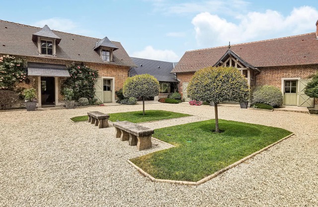 Enjoy privacy and luxury in this villa on a beautiful estate.