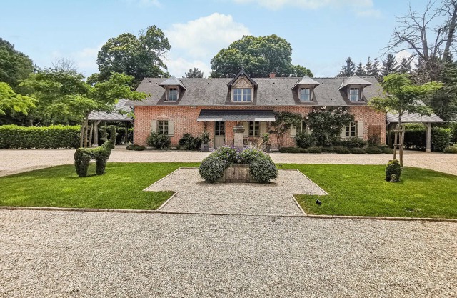 Enjoy privacy and luxury in this villa on a beautiful estate.