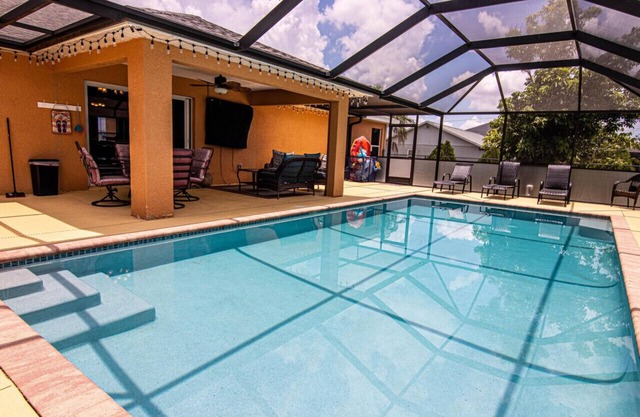 Enjoy the Salt Life with this Heated Saltwater Pool and outdoor lanai.
