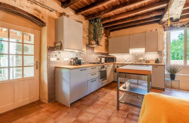 Enjoy tranquility, charming living and lush nature in this beautiful mill complex.