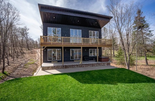 Escape to Chub Lake Retreat: Waterfront Luxury House in Carlton, Minnesota