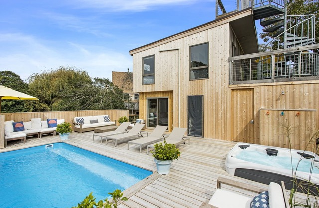 Escape to this FIRE ISLAND PINES BEACH HOME with Heated Salt Water Pool