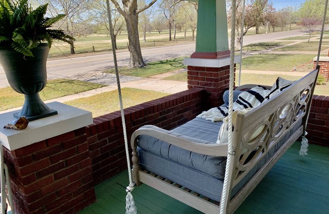 Esmeralda on the Green, golf course views from darling porch with daybed swing!