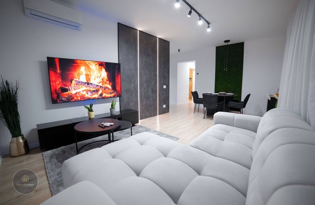 Executive 2BR Apartment Sleeps 4 Near Promenada Mall with Balcony and Fast WiFi