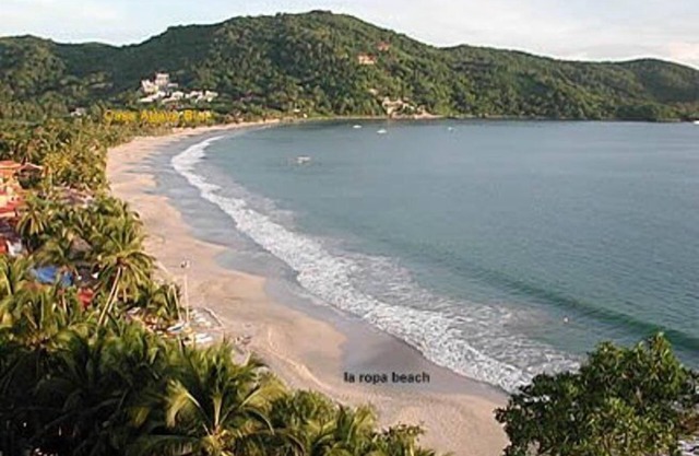 Fabulous views, overlooking beautiful La Ropa Bay; steps from the beach.