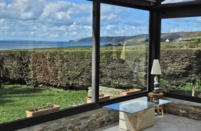 Facing Vauville sandy beach and sunset, your family garden retreat. Pet friendly